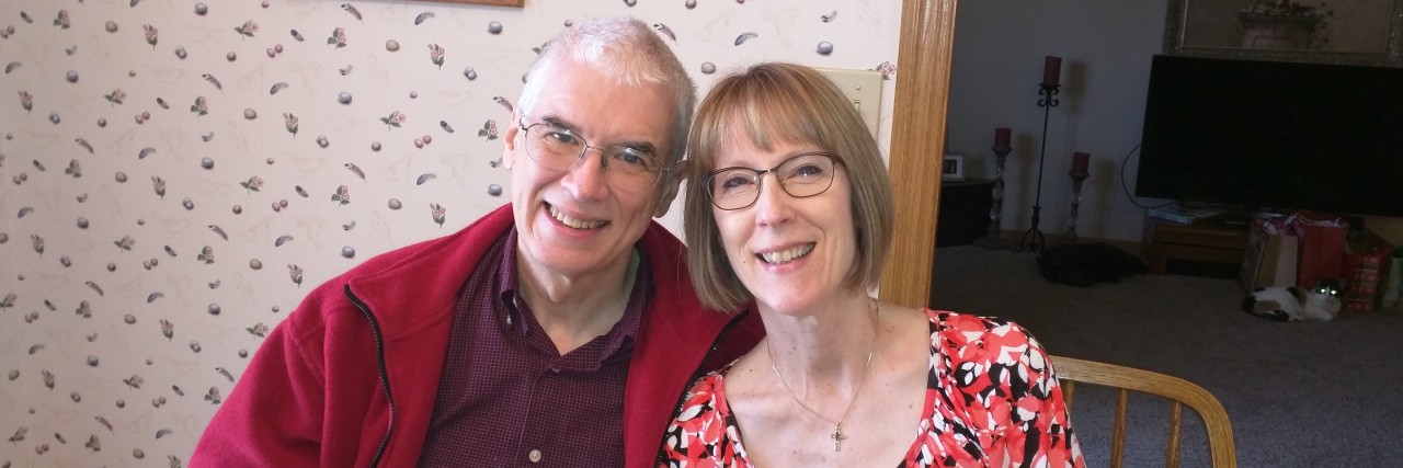 What I Learned Early On After Being Diagnosed With Breast Cancer A man and a woman sitting at a kitchen table