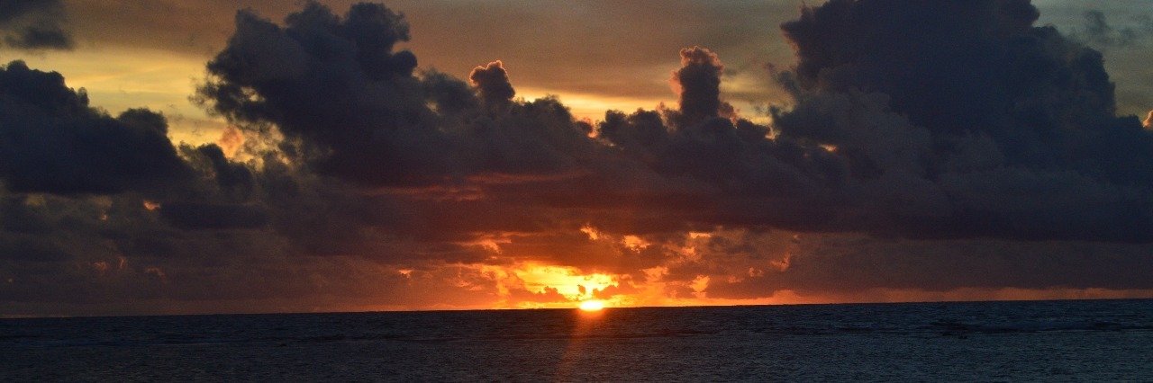 When Depression Feels Like Being in Fog Sun breaking through dark clouds over water