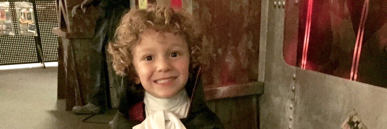 little boy dressed as dracula