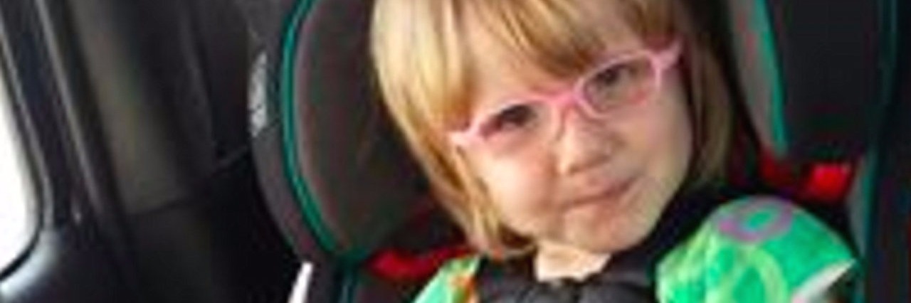 A Letter to My Daughter With Ehlers-Danlos Syndrome young girl in a car seat