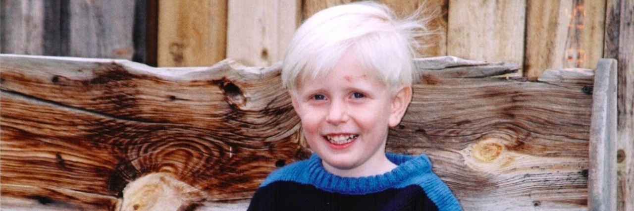 A Response to the 'Suicide Scar' Costume Sold on Walmart.com An older picture of Lisa's son, sitting next to a pumpkin