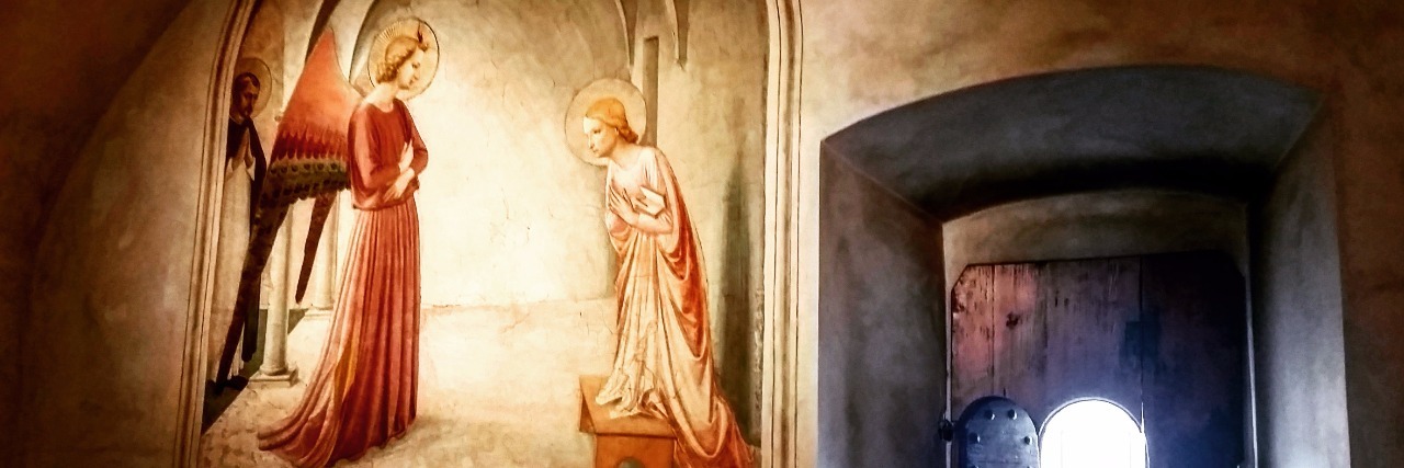 Learning to Accept Myself With Mental Illness a painting on a stone wall