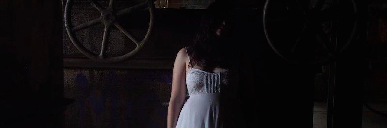 BPD and Suicidal Thoughts: Learning How to Save Myself a girl standing in shadows