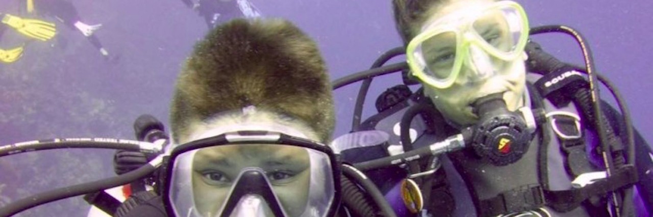 mother and son scuba diving
