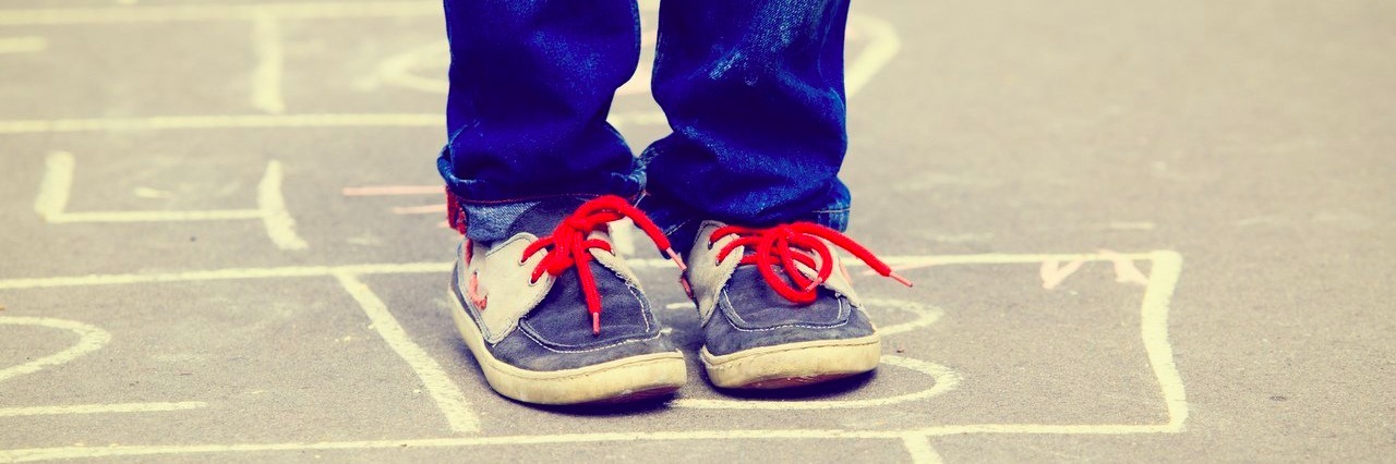 More Autism Awareness in Schools Can Help End Bullying little boy playing hopscotch