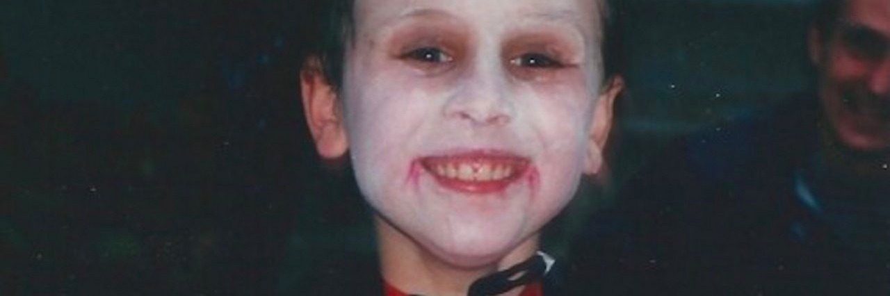 Celebrating Halloween With My Son With Autism boy in a Halloween costume