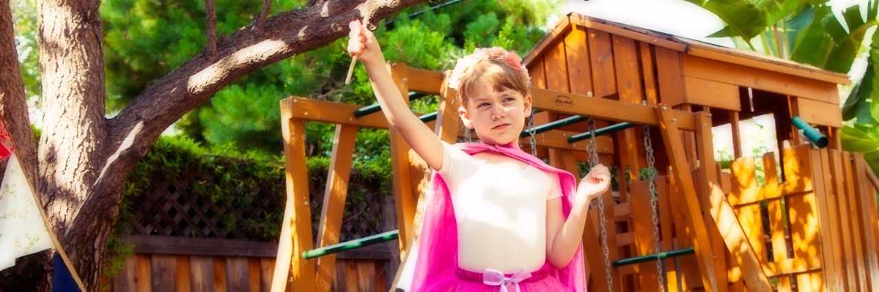Kristina Bant Jenkins Photographs Kids for 'THIS is Autism' Series Young girl wearing a fairy costume outside with two other children