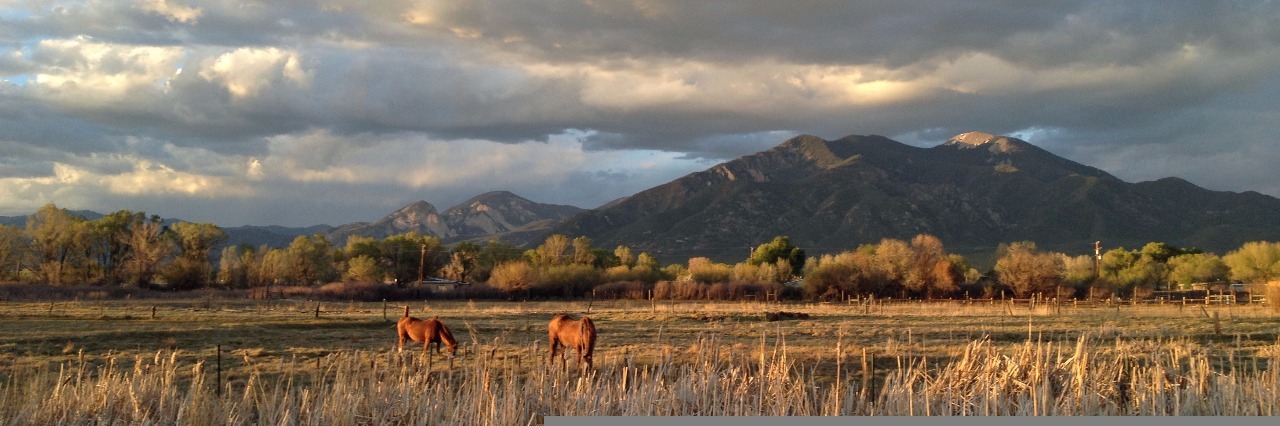 Advice for Living With a Chronic Health Condition In a Rural Area field and rolling hills under blue sky and clouds