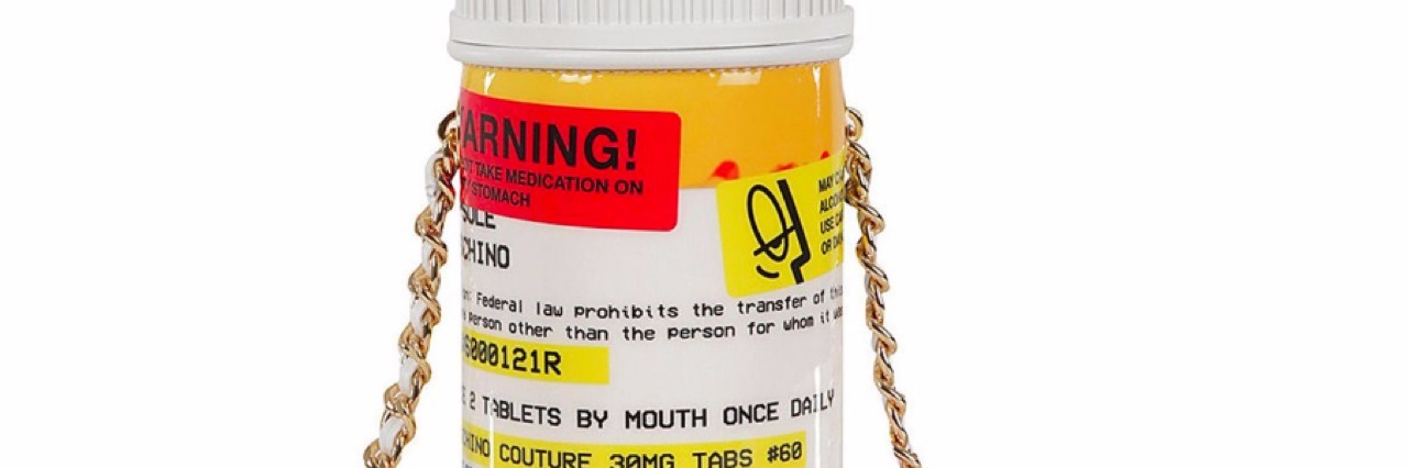 Moschino Capsule Collection Draws Protests From Addiction Activists Purse that looks like a pill bottle