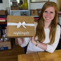 Aishleen O'Brian holding Nightingale Express Box