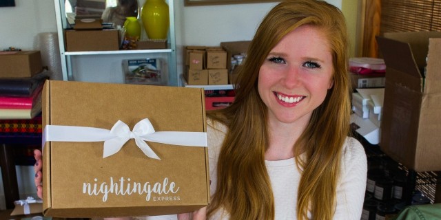 Aishleen O'Brian holding Nightingale Express Box