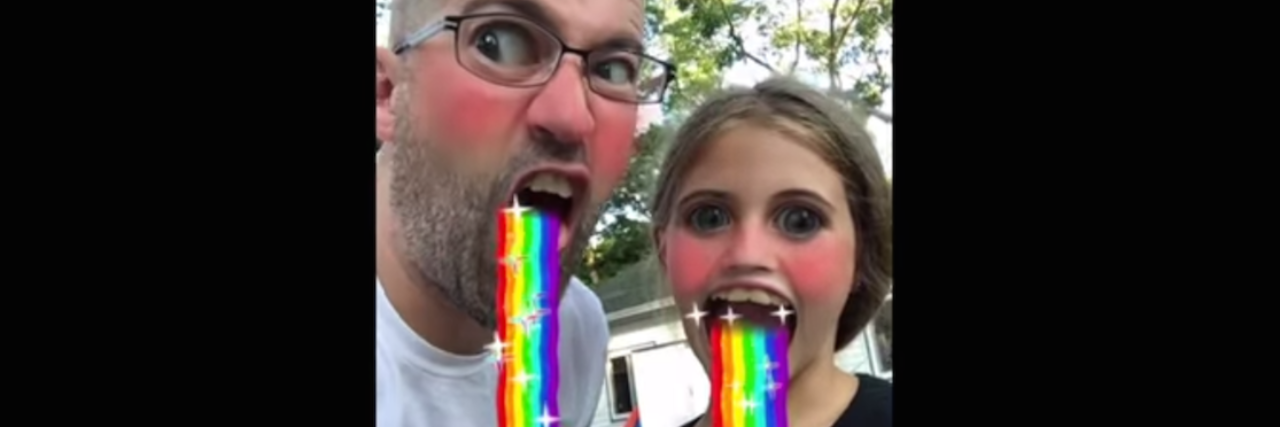 Snapchat Helps Young Girl With Exposure and Response Therapy A man and his daughter using a rainbow throw up Snapchat filter.