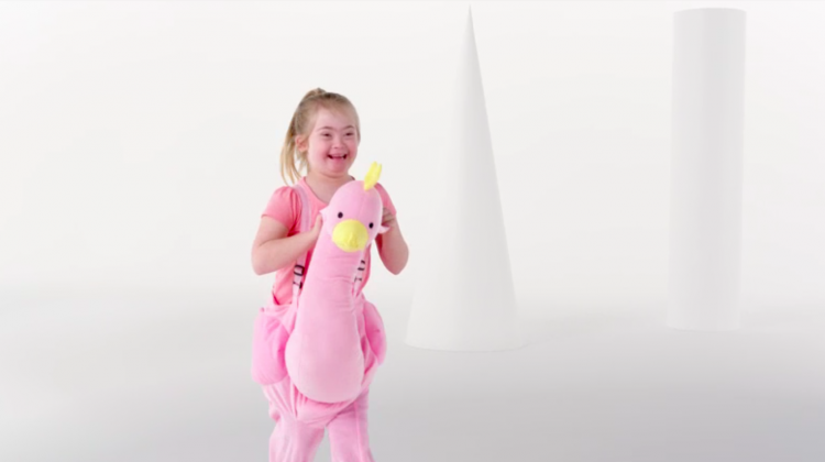 Girl wearing pink bird costume