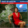 Photo of weatherwoman using a wheelchair during forecast.