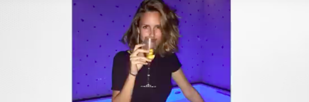 Real Story Behind the @louise.delage Instagram Account Instagram picture of a woman drinking a glass of wine