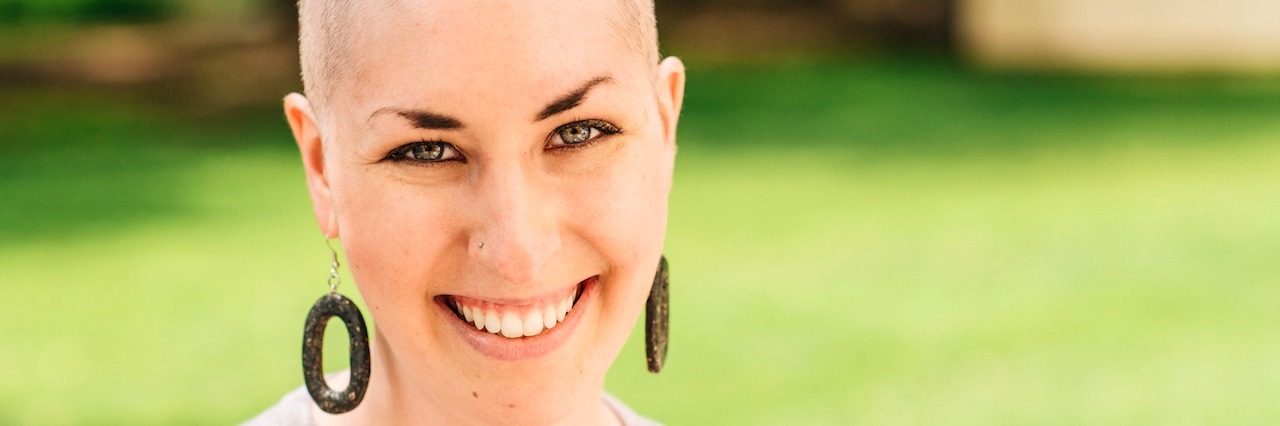 BFRB Awareness Week Story Challenge portrait of a woman with her head shaved