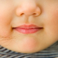 close up of a young girls mouth