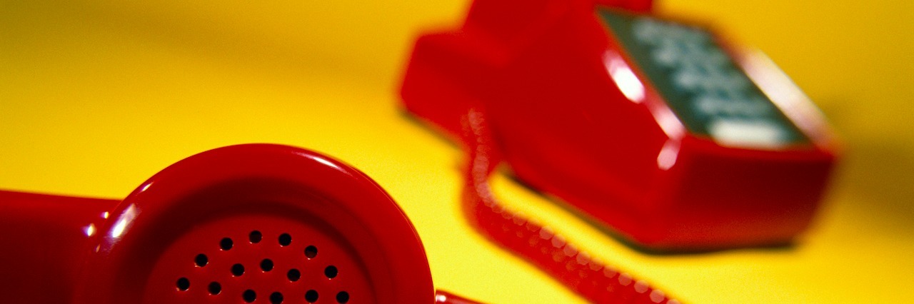 What It's Like to Work for a Suicide Prevention Lifeline Close-up of a telephone receiver off the hook