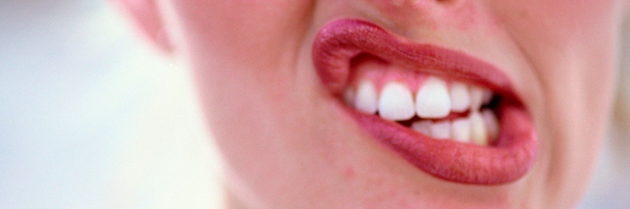 When Social Anxiety Looks Like Talking Too Much a woman making a silly face with her mouth