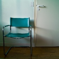 a chair in front of a door