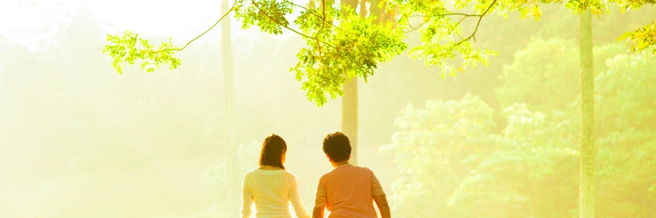 Letter to My Mother Who Was Diagnosed With Multiple Sclerosis Mother and adult daughter walking in park under the trees