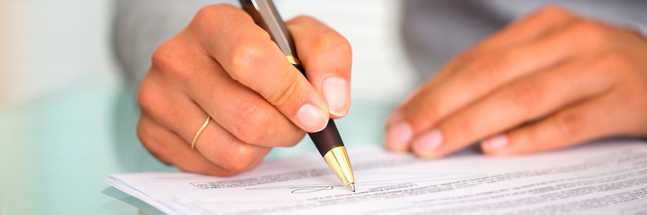 How to Help a Family Member Who's Psychotic: Advance Directive woman signing a contract