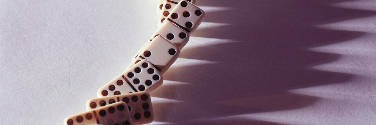 Living With a Mental Illness and Overwhelmed by 'Little Things' A line of dominos falling