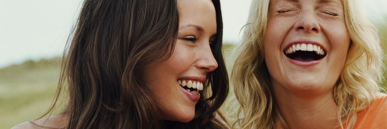 What It's Like to Have a Favorite Person When You Live With Borderline two young woman laughing, sitting outside