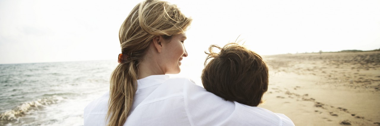 Learning to Be More Open to What My Son on the Autism Spectrum Needs Mom and son walking on beach