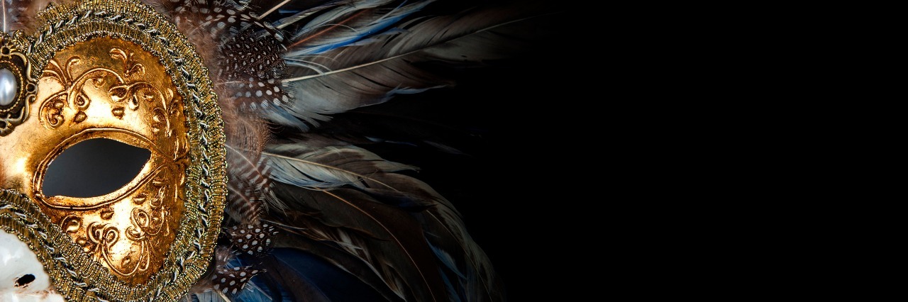 Halloween and Living With Mental Illnesses colorful venetian mask with many details on it