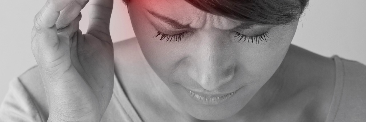 Wondering What My Life Would Be Like Without Headache and Migraine woman with pain, headache, migraine, stress, insomnia, hangover in casual dress, hand holding head, front view closeup