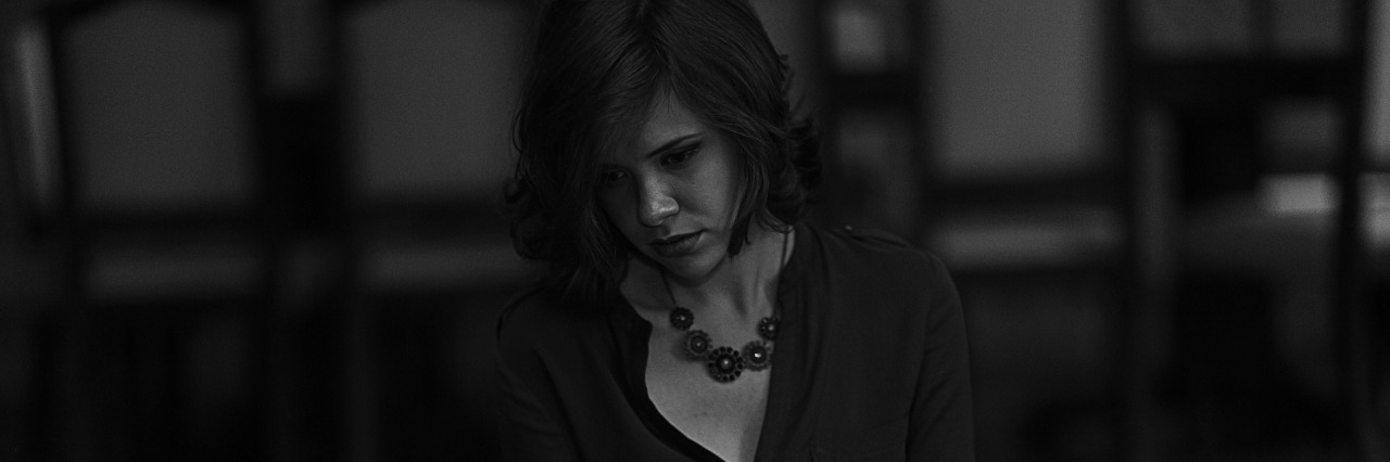 Asking for Help With Mental Illness Is a Hard Thing girl sitting looking scared