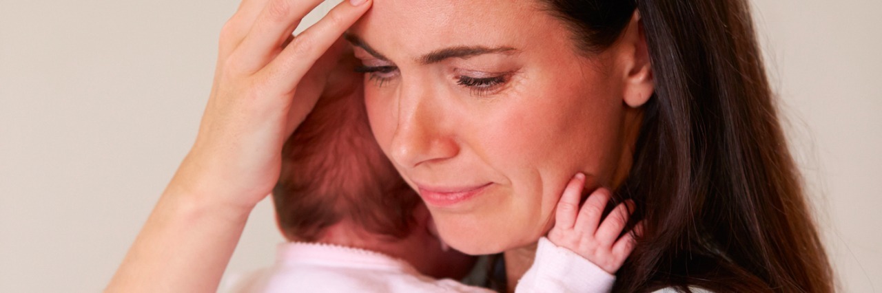 Why Is Postpartum Depression So Hard to Talk About? Mother With Baby