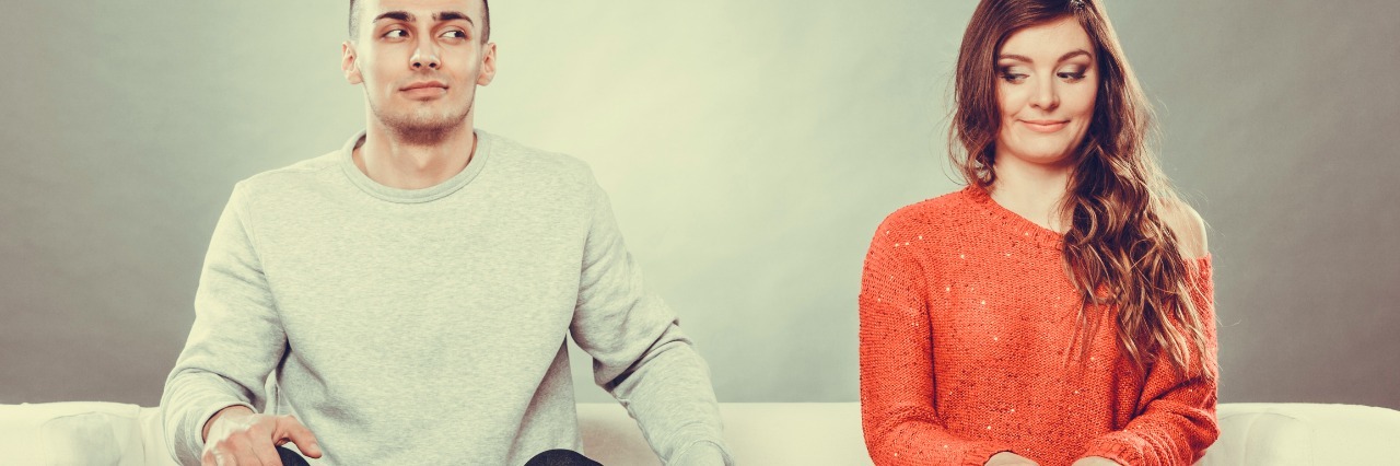 To People With Anxiety Who Think They Can’t Date shy woman sitting next to a man on the couch