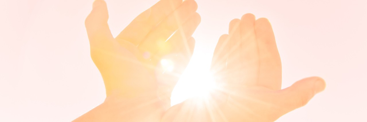 What Not to Say to Someone Who Self-Harms hands reaching out towards the sun