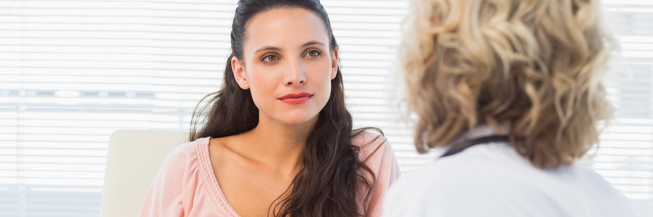 What to Talk to Your Provider About Regarding Postpartum Depression A woman at the doctor