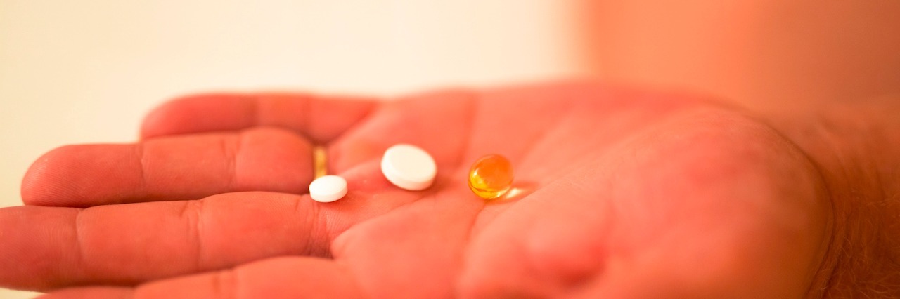 Love-Hate Relationship With My ADHD and Anxiety Medication woman with medications in her hand