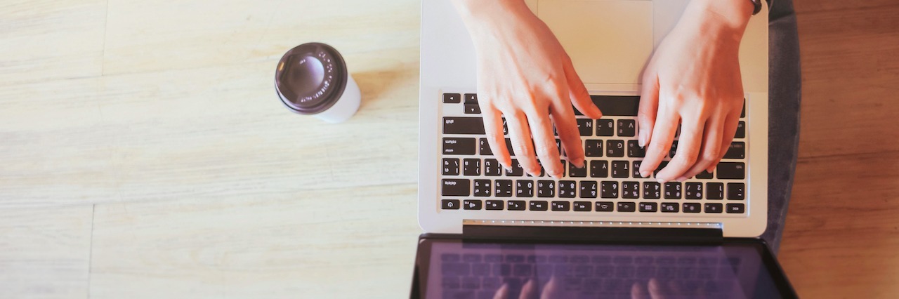 woman sitting at a computer