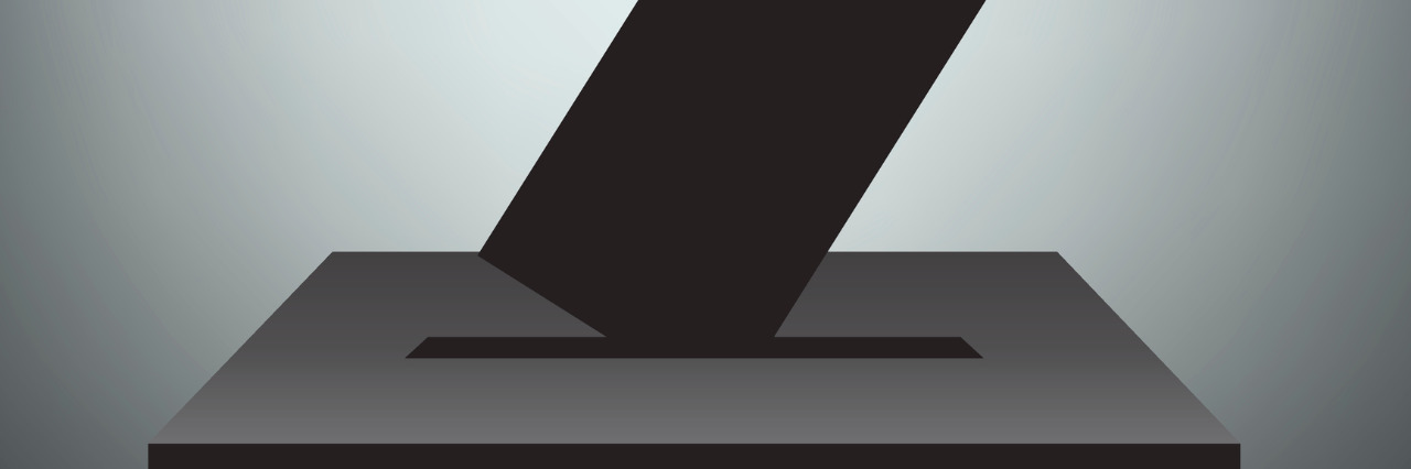 Disability, Sexual Assault and the 2016 Election Hand with voting ballot and box.