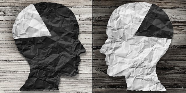 Looking Beyond Stigma: What's Next for Mental Health Advocacy? image of two heads facing each other
