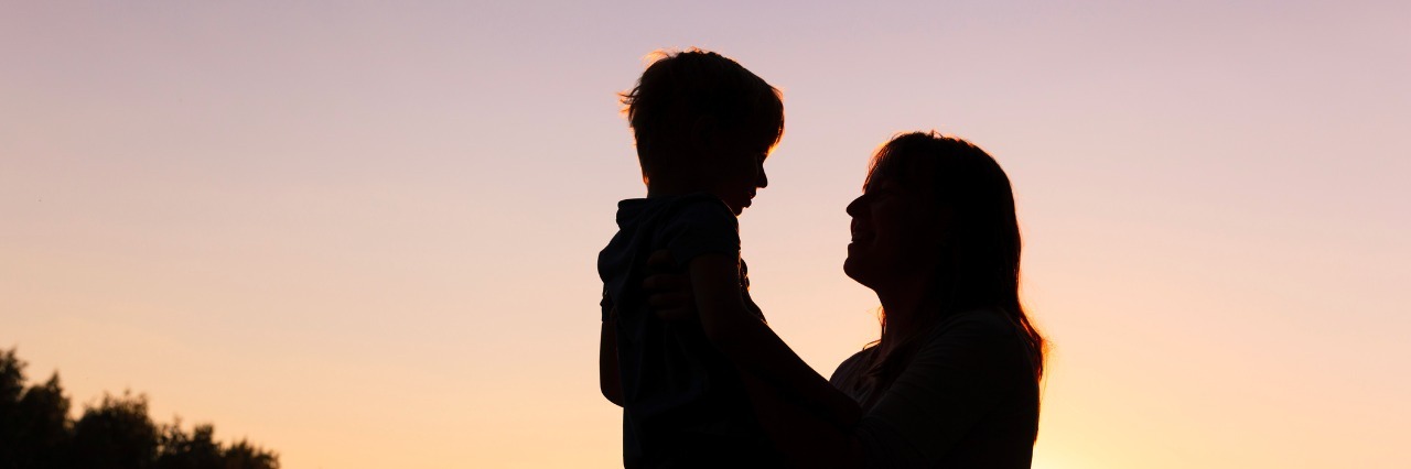 Teaching Others About Your Child's Short Bowel Syndrome Diagnosis happy loving mother and little son at sunset