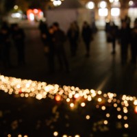 a group gathered in the dark