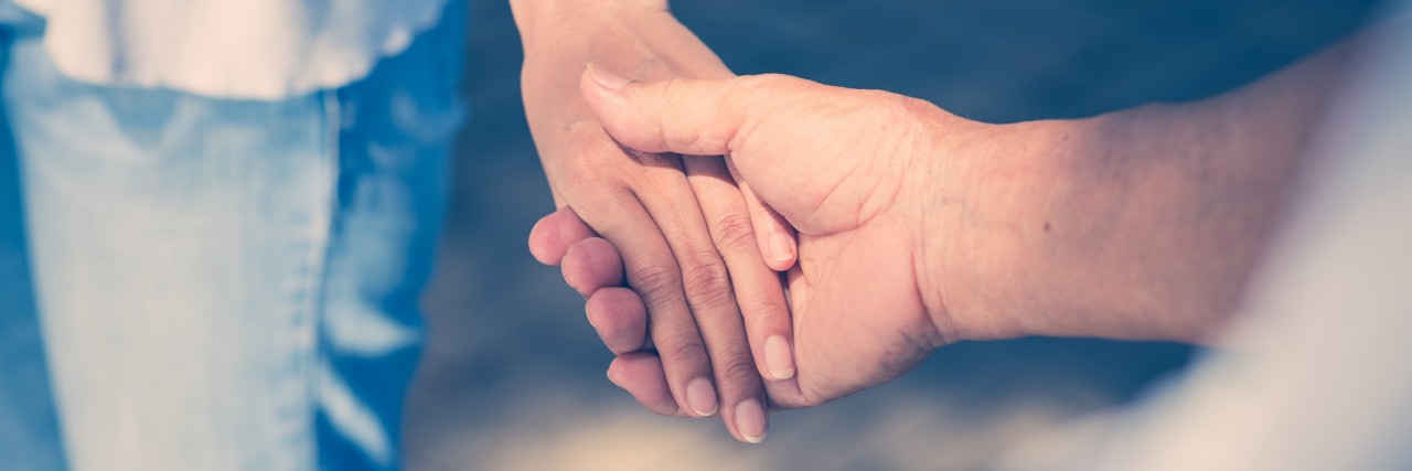 Tips to Help Someone With Borderline Personality Disorder holding hands
