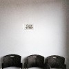 chairs against a wall in a waiting room