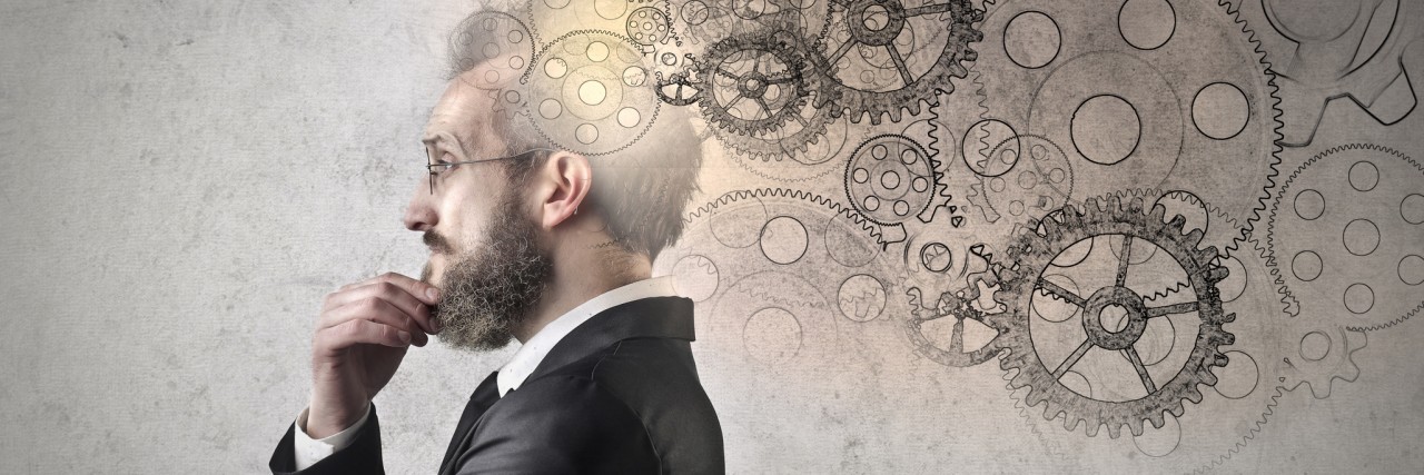 Inspirational Quotes for People With Mood Disorders man thinking hard with wheels coming out of his head