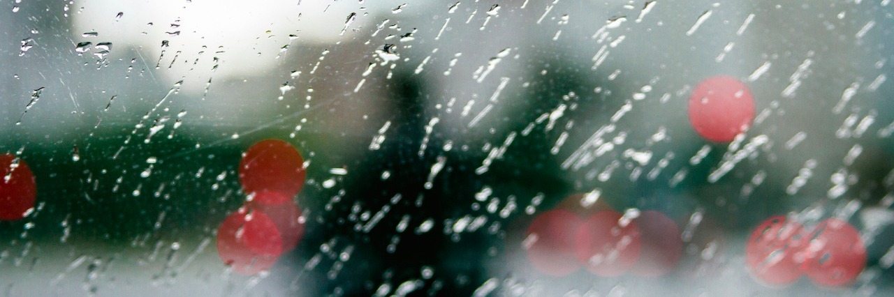 view of rain through a wet window