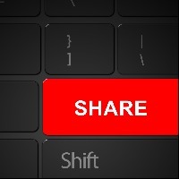 a bright red share button on a keyboard