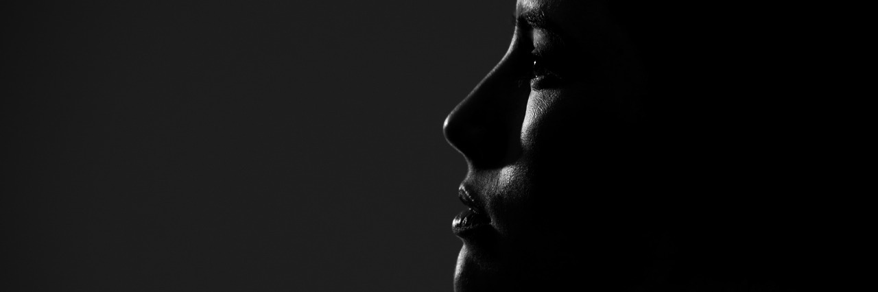 What It Feels Like to Be Depressed and Want to Kill Yourself Silhouette side portrait of young pretty woman looking away