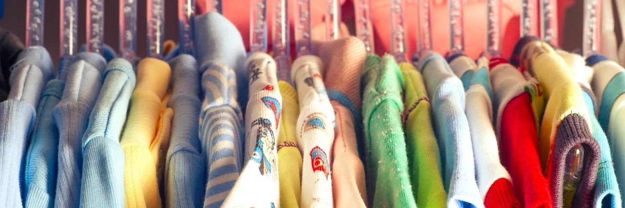 Lesson From My Son With Cerebral Palsy set of clothes for kids on hangers