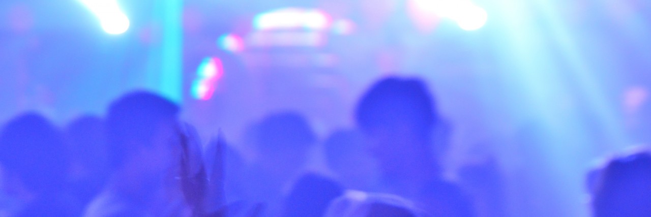 What Autism and Sensory Overload Can Feel Like club party is blurred background